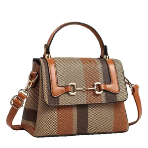 Chic color block canvas tote bag with retro brown leather trim and golden horsebit