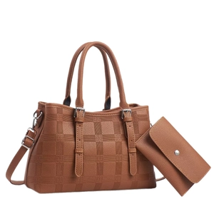 Brown tote bag and matching wallet set with geometric embossed faux leather pattern