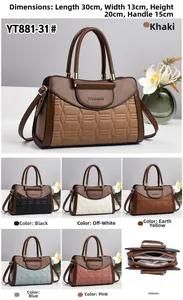 Detail view of large capacity tote bag with diamond lattice texture and internal compartments