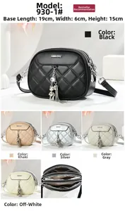 Quilted mini crossbody bag with triple zippers and metallic bear charm, 19x6x15 cm size