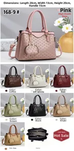 Detail view of large capacity fashion tote with internal multi-layer storage compartments