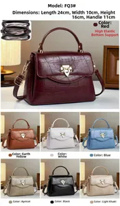 Detail view of crocodile texture handbag with gold triangular buckle and color options