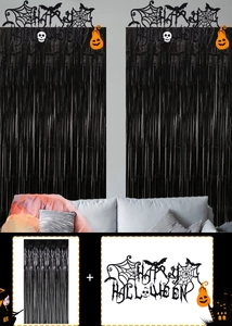 Halloween party set with black metallic fringe curtains and Happy Halloween banner