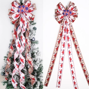 Patriotic Christmas tree topper bow with red truck and stars stripes on faux burlap