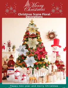 Glitter hollow decorative poinsettia flowers hanging on a festive Christmas tree setup