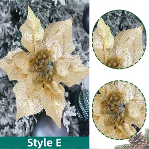 Macro detail of Style E gold hollow Christmas poinsettia flower with glitter finish