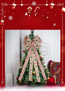 Detail of a large burlap Christmas tree bow with Merry Christmas text and red trim