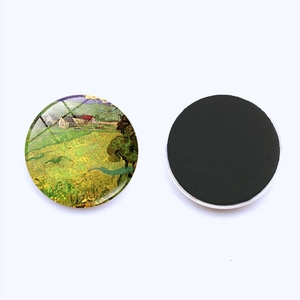 Detail of round Van Gogh painting magnet showing artistic front and black magnetic back