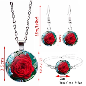 Red rose glass gem jewelry set including necklace, earrings, and bracelet with alloy base
