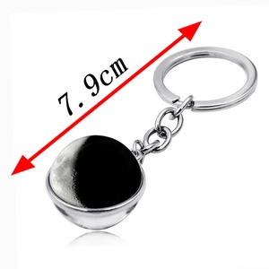 Silver celestial moon glass ball keychain with double-sided design and 7.9cm total length