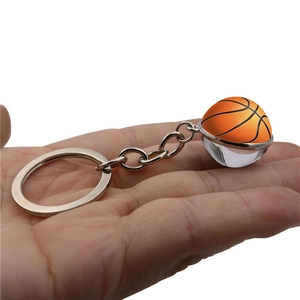 Handheld basketball keychain with double-sided glass ball pendant on silver metal ring