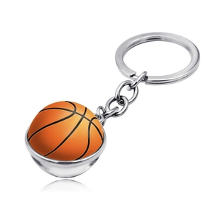 Detailed view of sports basketball keychain with textured glass ball and silver metal ring