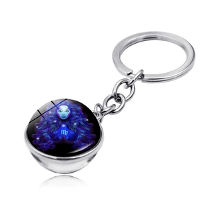 Detailed macro view of the Virgo glass cabochon pendant with blue artistic constellation art