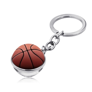 Close-up of a realistic basketball keychain with textured surface and silver ring