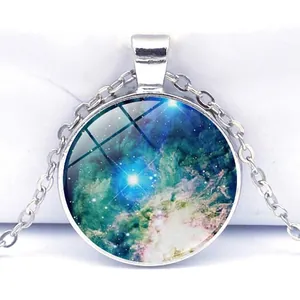 Detailed top view of a silver nebula galaxy pendant with an O-shaped metal chain