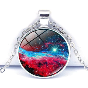 Macro shot of solar system nebula pendant with vibrant glass dome and silver chain