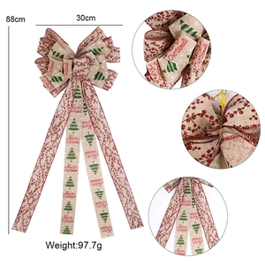 Large Merry Christmas bow tree topper with burlap texture and festive pine berry prints