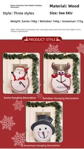 Macro detail of wooden Christmas countdown clock ornaments featuring reindeer and Santa