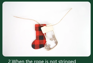 Detail of wooden Christmas sock charms showing the stringed red plaid and snowflake styles
