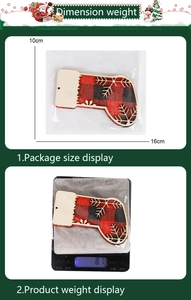Detailed view of red and black plaid wooden Christmas stocking pendant with snowflake