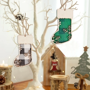 Set of 2 Christmas stocking wood ornaments with snowflake cutout and plaid fabric pattern