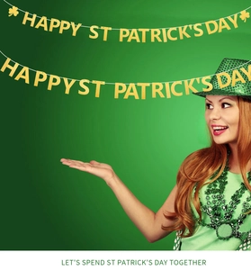 Golden glittery Happy St. Patrick's Day banner with shamrock accents for festive decor