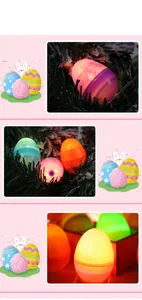 Decorazione pasquale con uova LED multicolore che brillano su un ramo d'albero