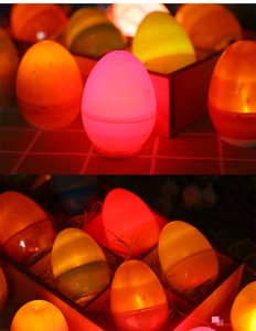 Luminous LED Easter egg lights with frosted finish in warm multi-color scene setup