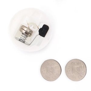 Detail of LED Easter egg light base with toggle switch and two AG10 button batteries