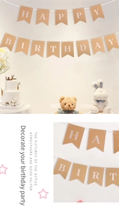 Vista macro dello striscione Happy Birthday in carta kraft con lettere bianche per bimbi