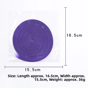 Macro detail of a purple spiral Halloween party hanging decoration in plastic packaging