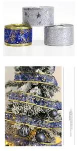 Blue and silver Christmas ribbons with gold snowflakes and LED lights for tree decor