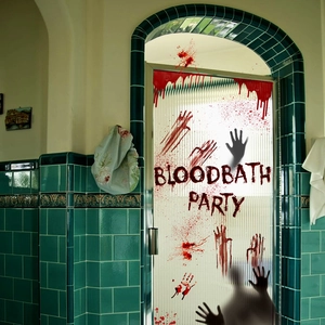 Macro shot of Bloodbath Party window clings featuring blood splatters and handprints