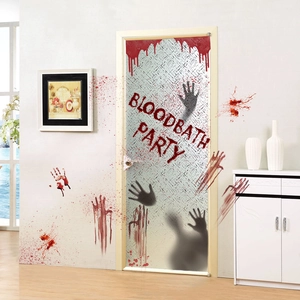 Close-up of bloody handprint decals and Bloodbath Party sign for Halloween decor