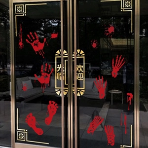 Spooky Halloween window stickers with bloody handprints and footprints decorations