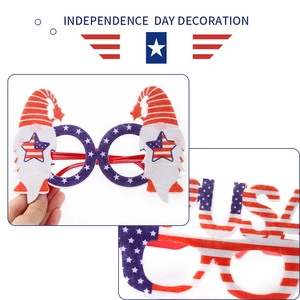 Close-up of Independence Day themed USA letter glasses and star pattern gnome party frames