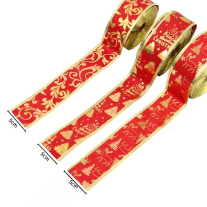 Three rolls of 5cm red Christmas ribbons with gold foil patterns of elk and snowflakes