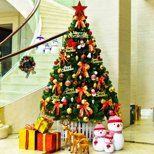 Detailed Christmas tree set with red star topper, ornaments, and festive reindeer props