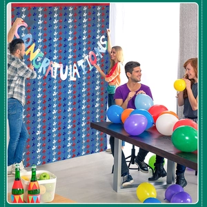 Detail of colorful congratulations banner with red white and blue bird fringe curtains