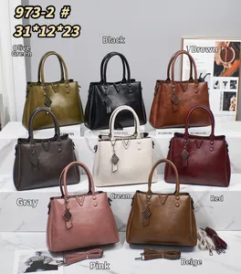 Collection de sacs à main rétro en cuir PU texturé avec détails métalliques en V