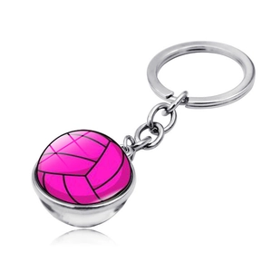 Detail view of a pink volleyball glass cabochon keychain with silver metal ring and chain