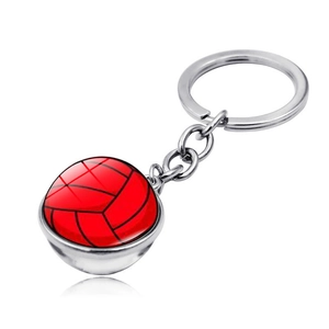 Close-up of a double-sided volleyball glass ball keychain with shiny silver metal finish