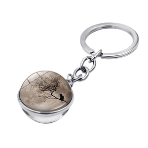 Blue moon branch and black cat silhouette double-sided glass ball keychain charm