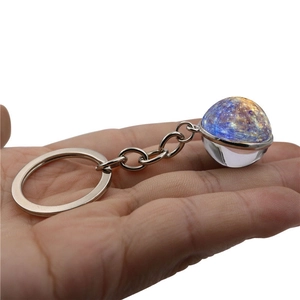 Cosmic galaxy double-sided glass ball keychain with starry nebula pattern in silver ring