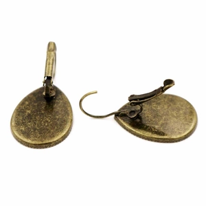 Vintage bronze teardrop leverback earrings featuring library and book theme time gems