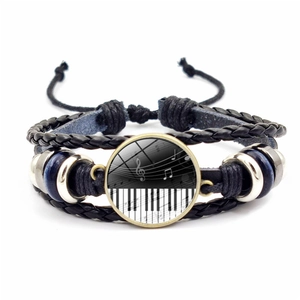Bracciale In Pelle Intrecciata Nota Musicale Tastiera Del Pianoforte Con Cabochon In Vetro Vintage Regolabile Per Uomo E Donna
