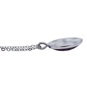 Silver Batman time gem necklace with textured oval pendant on a classic metal chain