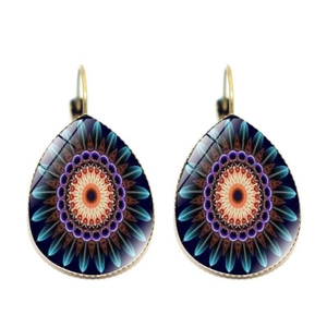Detail of bohemian teardrop earrings featuring colorful mandala patterns in resin finish