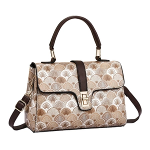 Classic patterned small square bag with brown leather handle and gold twist lock
