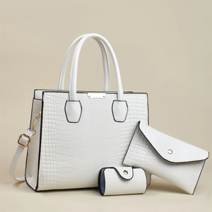 White 3-piece lizard pattern tote bag set with envelope clutch and small round pouch